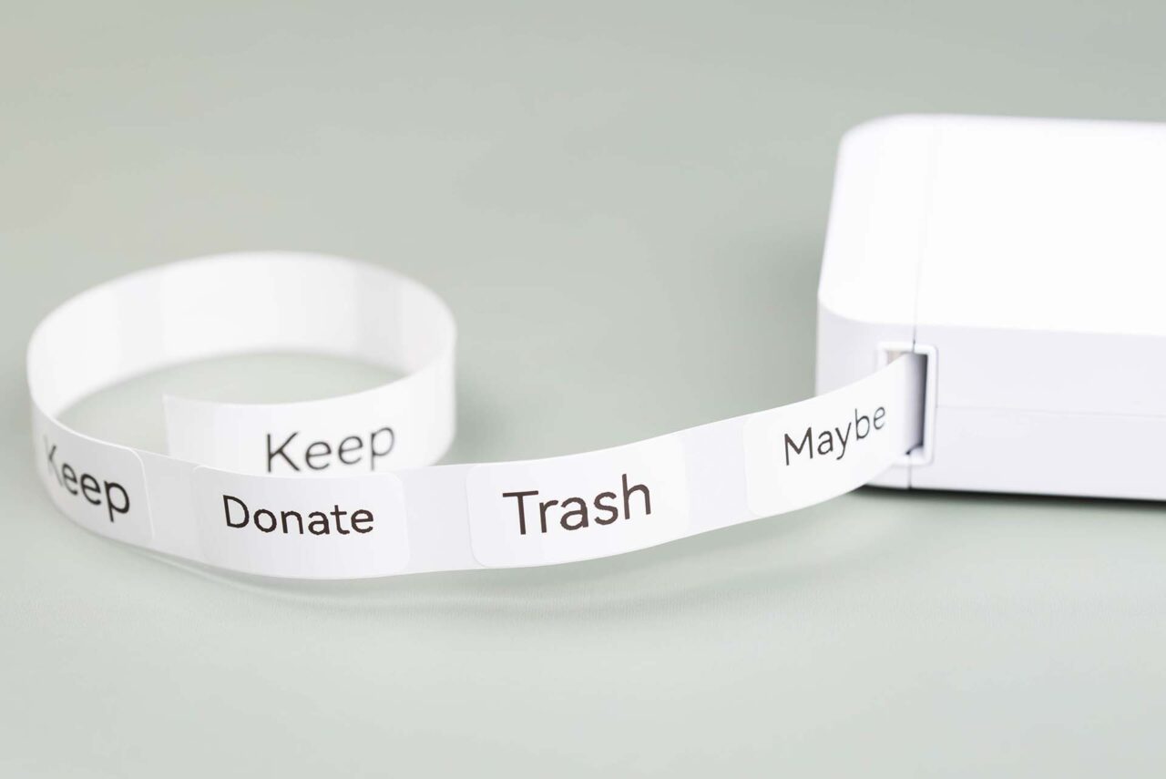 Labels read Keep, Donate, Trash, and Maybe, as categories for effective sorting