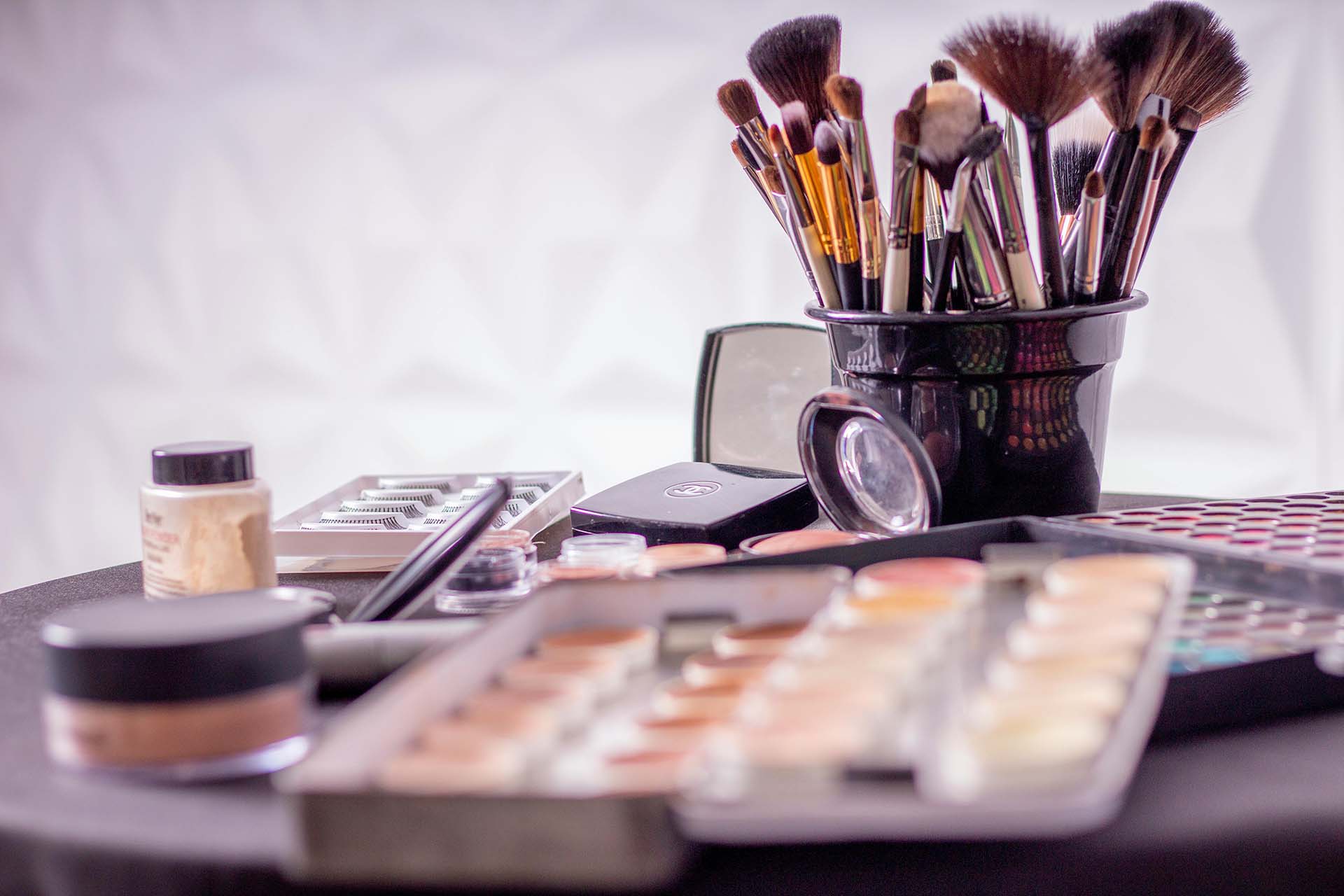 makeup and brushes on the table