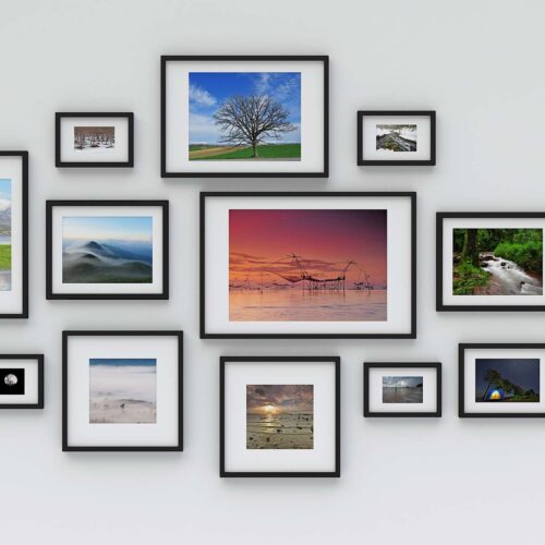 Photo frame on wall (3d rendering)