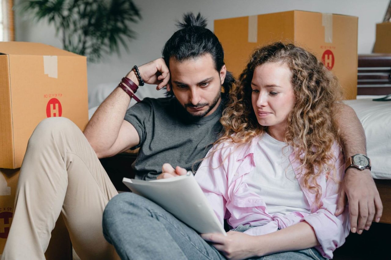 the couple is making a checklist for moving
