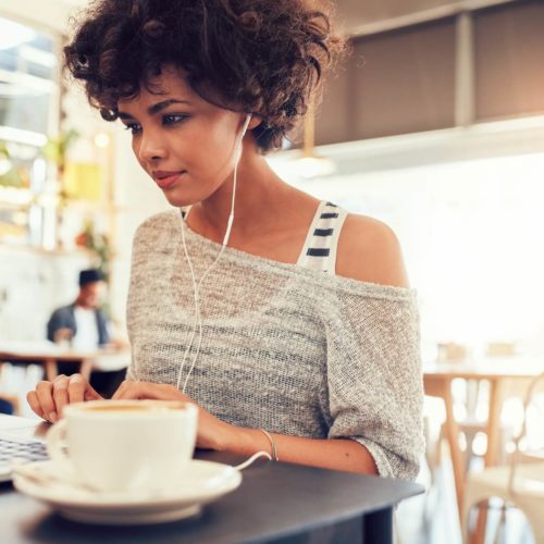 a-woman-looking-at-a-laptop