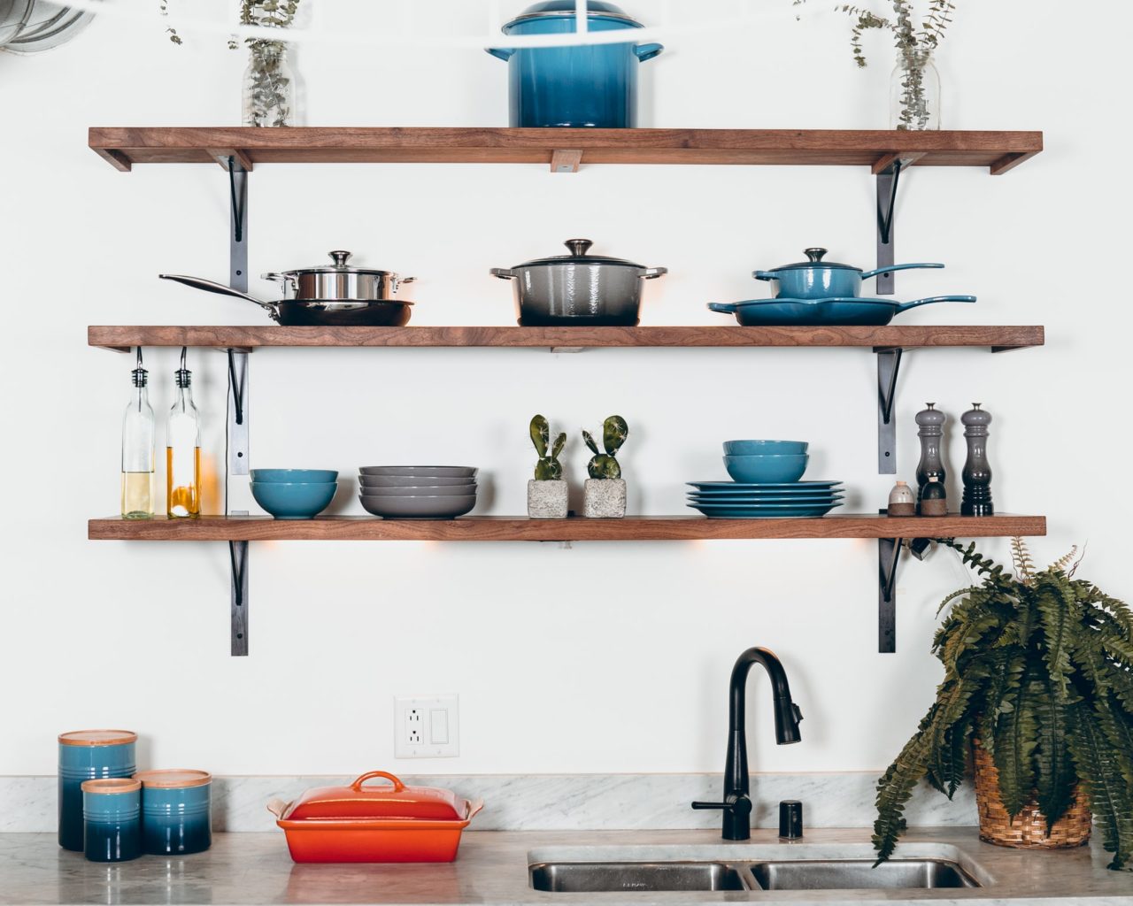 Stacked cookware on shelves