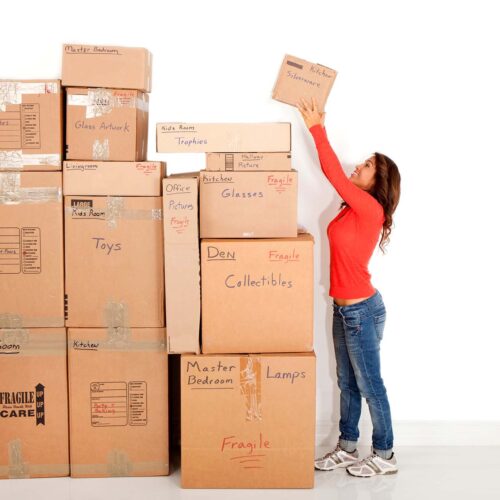 Woman packing and getting ready to move